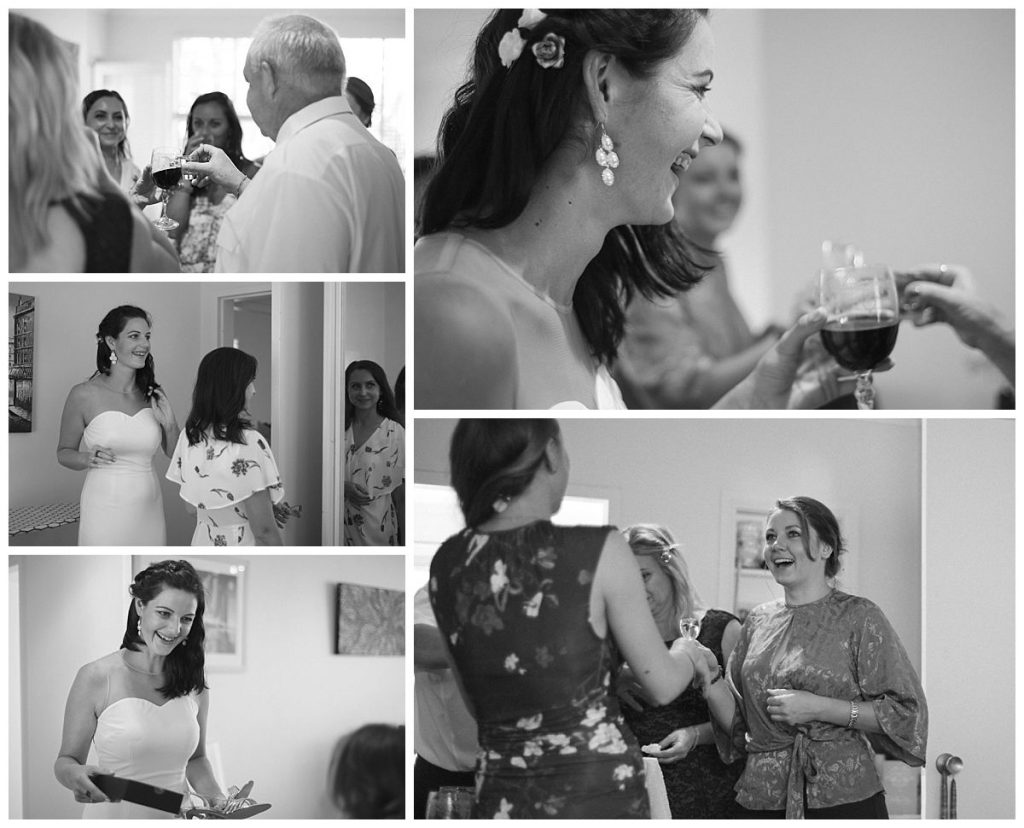 bride-is-getting-ready-at-home-with-parent-and-girlfriends-photo