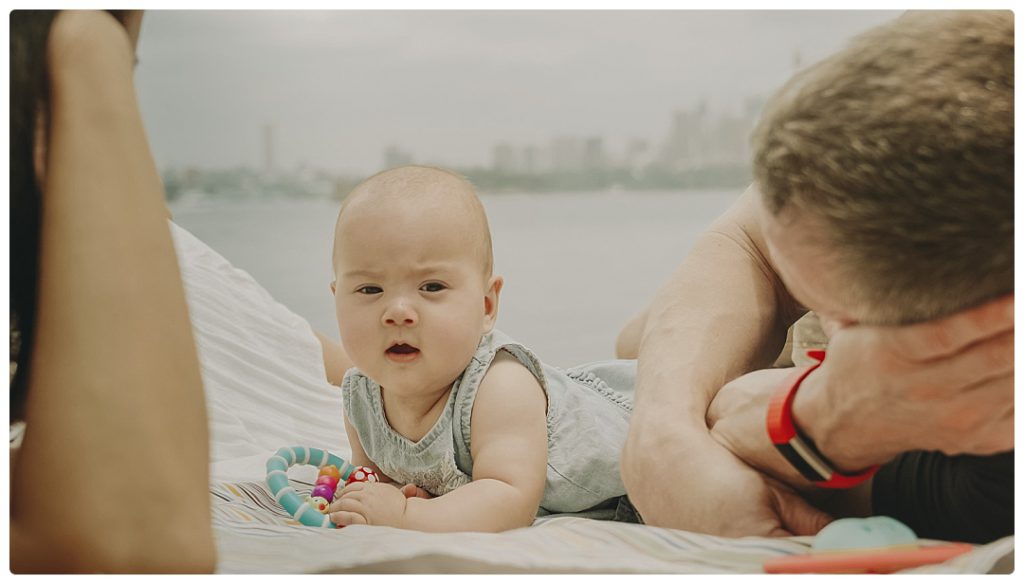 baby-lays-on-stomach-photo-session