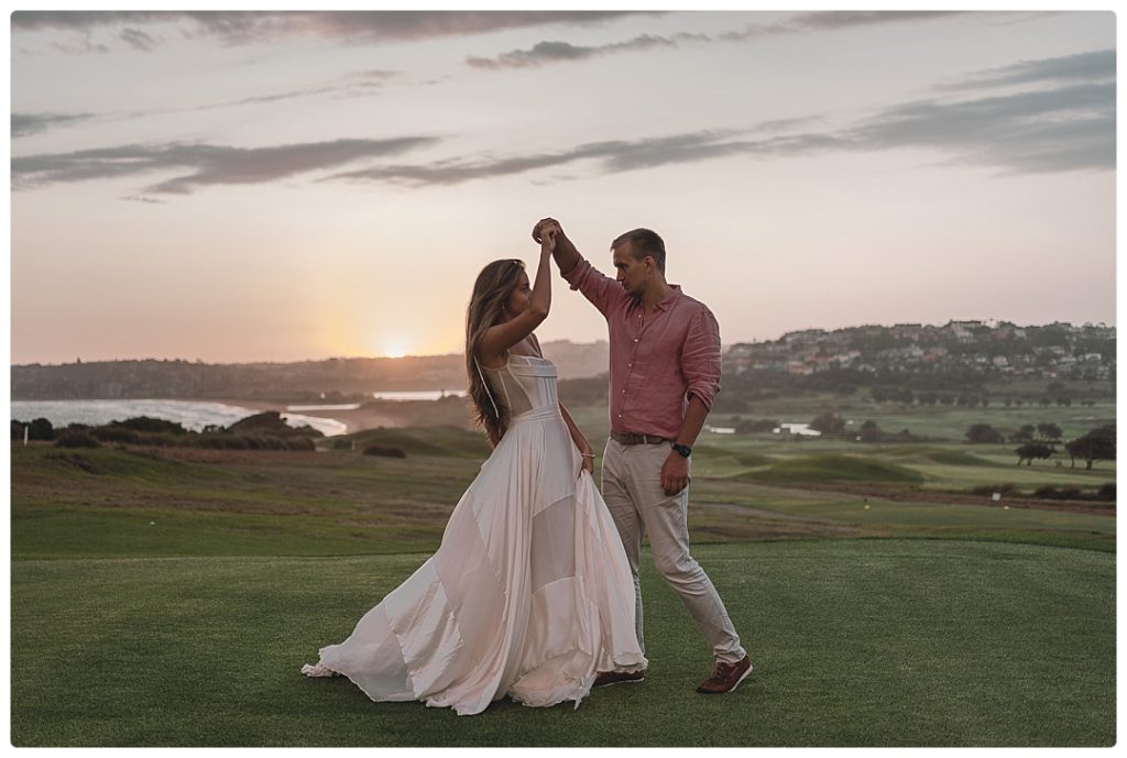 newly-married-couple-dance-on-the-golf-course-grounds-photo