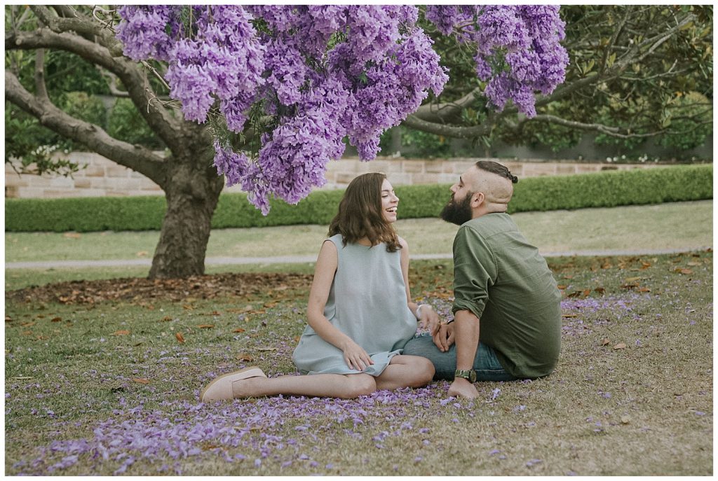 gorgeous-couple-in-jacaranda-flowers-photo