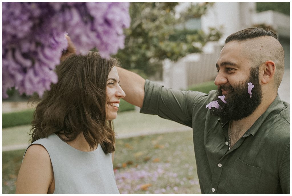 a-couple-portrait-under-jacaranda-tree-photo