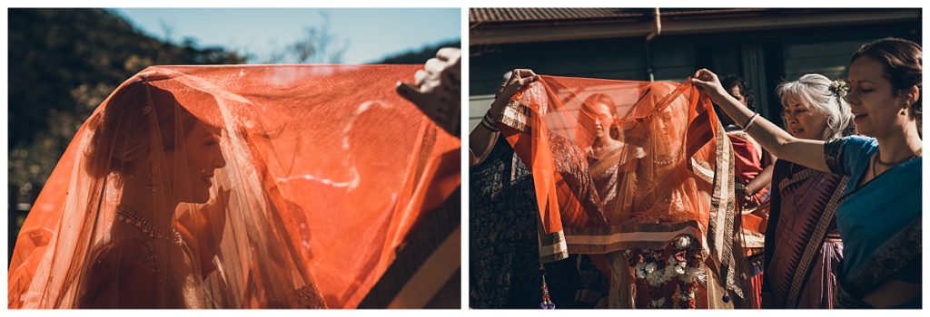 bride-covered-with-red-silk-sari-photo