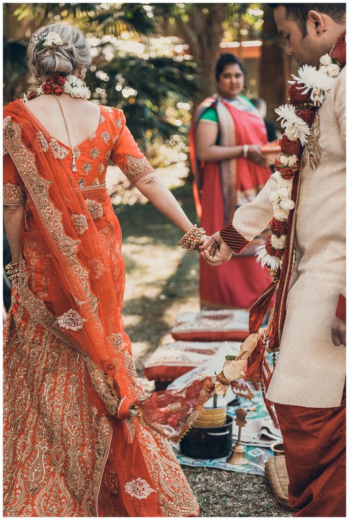 groom-follows-the-bride-indian-marriage-ceremony-photo