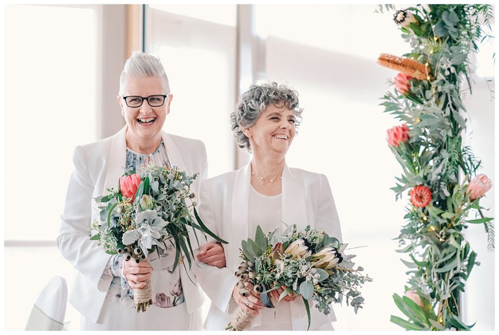 the-brides-laughing-at-the-wedding-ceremony-photo