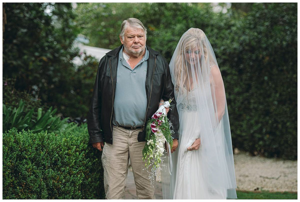 father-of-the-bride-walks-down-the-aisle-photo