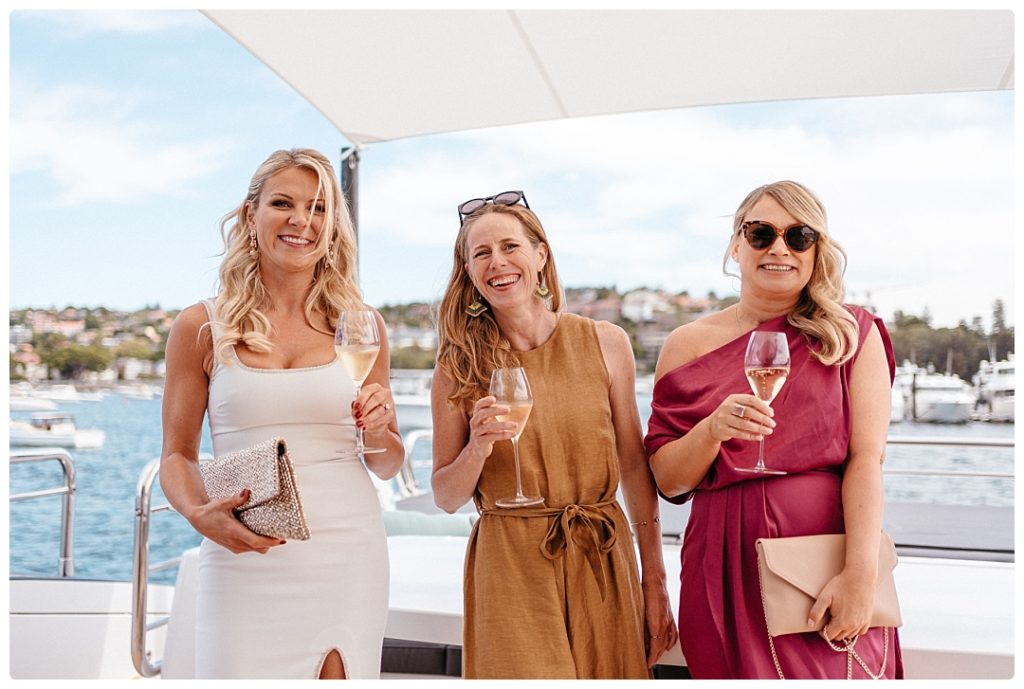 bridal party shampagne boat wedding